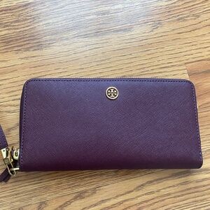 Tory Burch burgundy wristlet like new